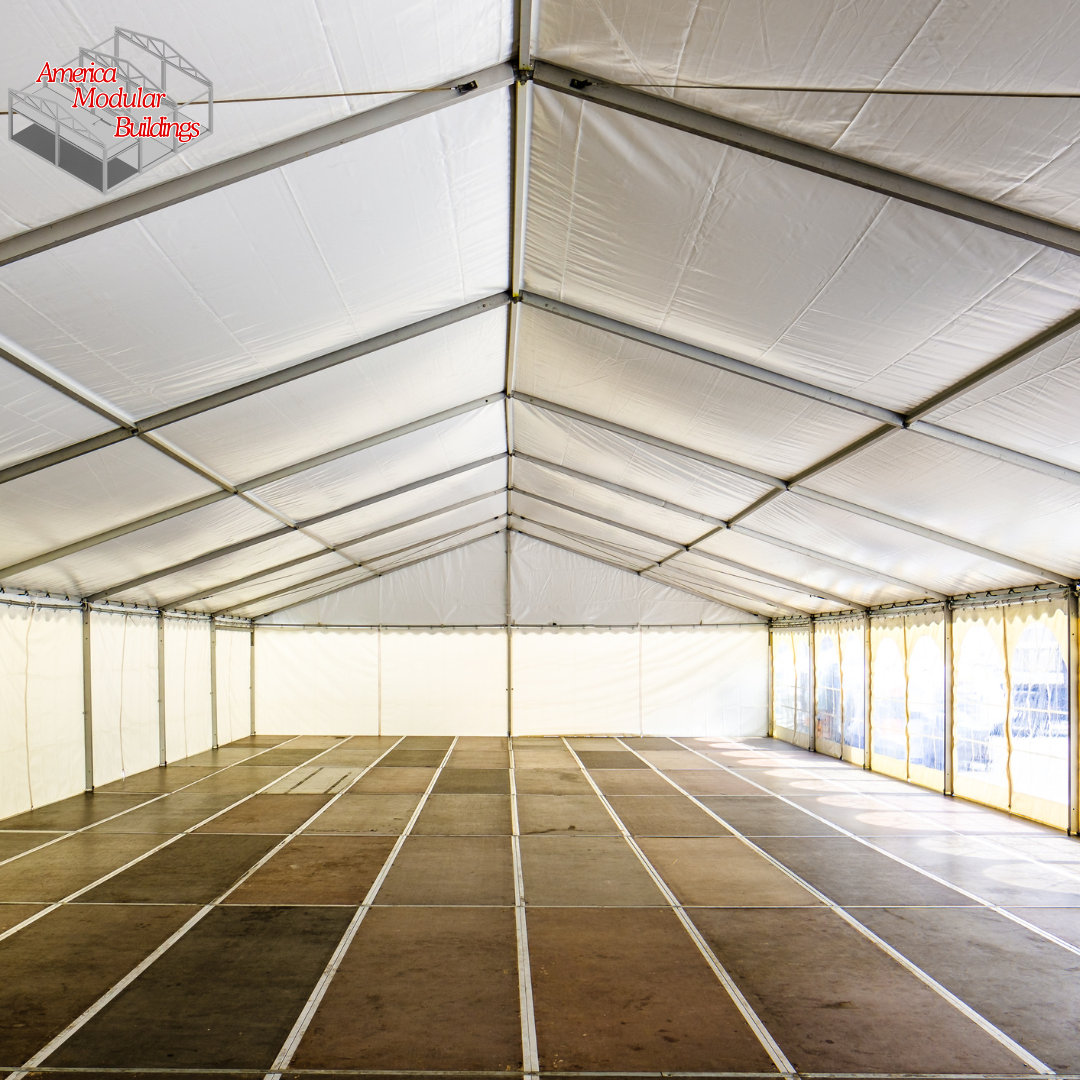 Large event tent set up for an outdoor gathering